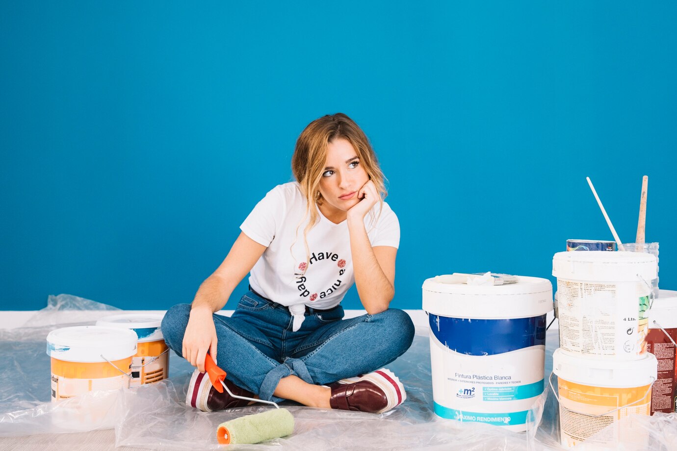 girl sitting paint materials 23 2147703603